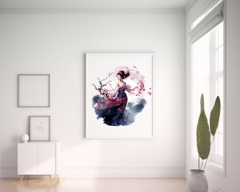 May include: A framed art print featuring a watercolor illustration of a woman in a flowing red and black dress, set against a backdrop of a pink moon and cherry blossoms. The artwork is displayed in a bright, minimalist room.