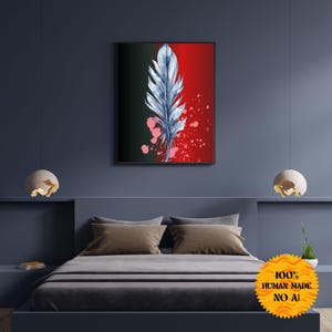 Może przedstawiać: Akwarela przedstawiająca pojedyncze białe pióro na czerwonym i czarnym tle. Pióro znajduje się w centrum obrazu i jest otoczone różowymi i czerwonymi plamami farby.