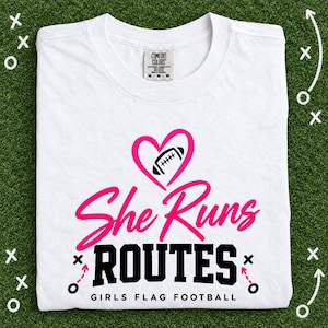 She Runs Routes Girls Flag Football Shirt, Pink Heart Football Graphic Tee for Football Mom, Player, Youth and Women Game Day Gift image 1