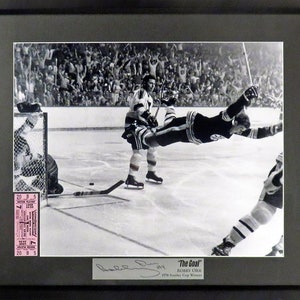 Framed Bobby Orr Autograph Replica Print - in The Air Goal - SportsCare Physical Therapy