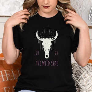 The wild side tee.  Women&#39;s adventure apparel untamed free-spirited shirts fearless themed trending instagram trendy tiktok foryou