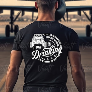 May include: A black t-shirt with a white graphic of an off-road vehicle and the text "Official Member Drinking Club" in a circle.