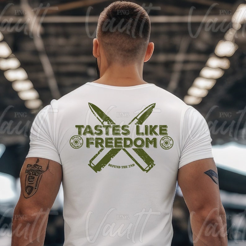 May include: White t-shirt with a green graphic of crossed bullets and the text "Tastes Like Freedom" with the words "Defend the 2nd" below.