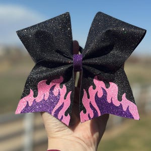 Double flame glitter bow