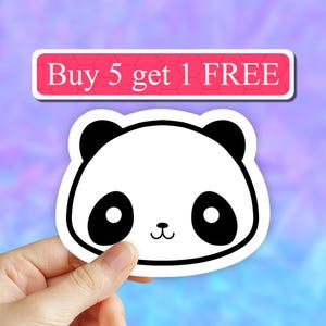 May include: A white and black panda sticker with a cute cartoon face. The sticker has a white background and black eyes, nose, and mouth. The text "Buy 5 get 1 FREE" is on a pink banner above the panda.