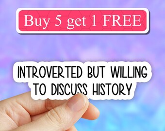 May include: White sticker with black text that reads "Introverted but willing to discuss history". A pink and white sticker with black text that reads "Buy 5 get 1 FREE" is above the sticker.