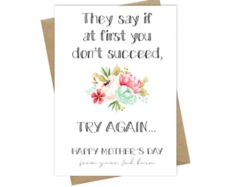 May include: A white card with a floral design and the text "They say if at first you don't succeed, TRY AGAIN... HAPPY MOTHER'S DAY from your 2nd born."