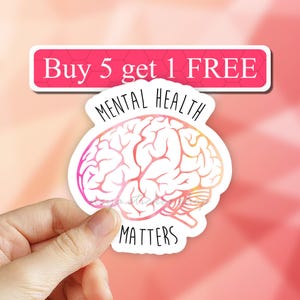 May include: A pink and orange brain outline sticker with the text "Mental Health Matters" and "Buy 5 get 1 FREE" in a banner above the brain.