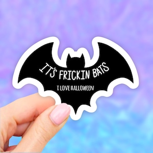 May include: Black and white bat sticker with the text "It's Frickin Bats I Love Halloween".