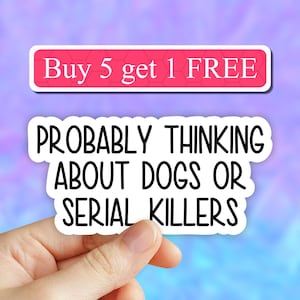 May include: White sticker with black text that reads "Probably thinking about dogs or serial killers".