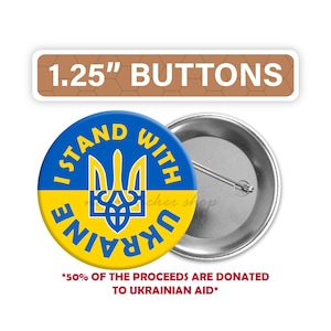 May include: A 1.25 inch button with a yellow and blue Ukrainian flag design. The button features the Ukrainian coat of arms, a trident, and the text "I Stand With Ukraine". The text "50% of the proceeds are donated to Ukrainian aid" is printed below the button.