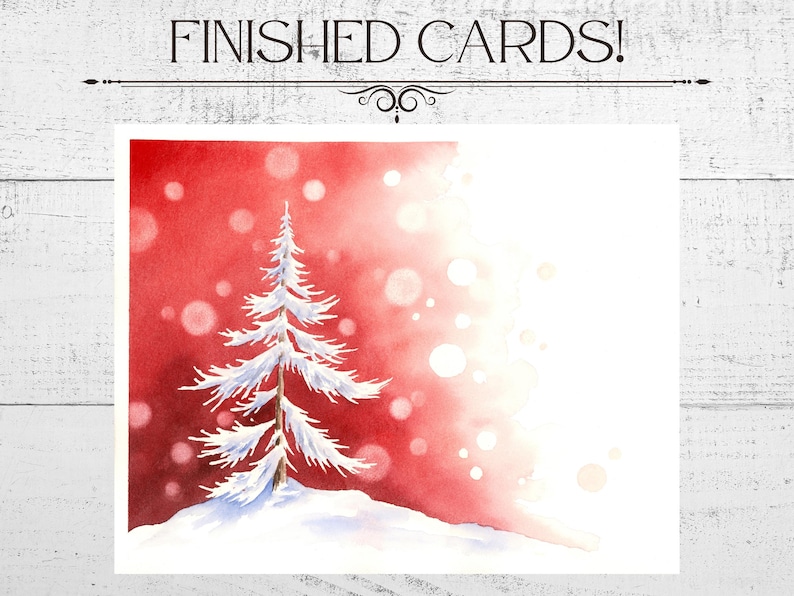 May include: Watercolor Christmas card featuring a snow-covered evergreen tree on a snowy hill against a red and white background with bokeh effects. The text "FINISHED CARDS!" is at the top.