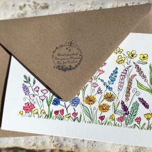 May include: A hand-painted card with a colorful floral design. The card is signed "Hand painted for you, Frances by Jo Miller".