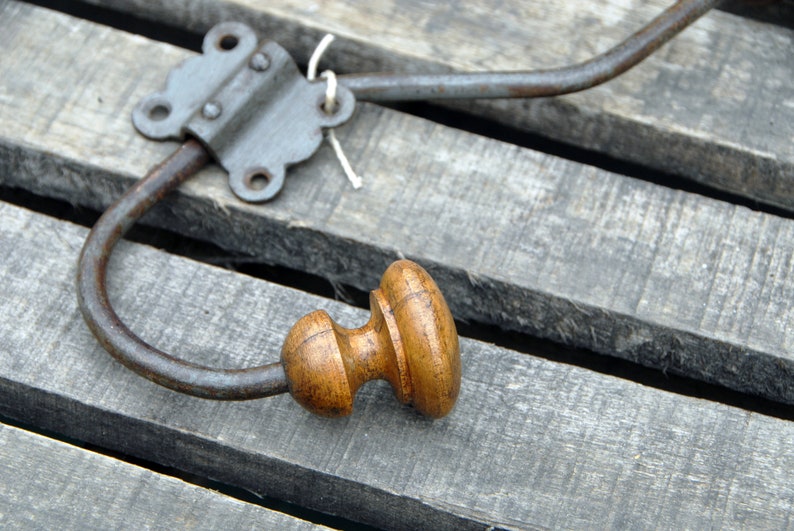 Old vintage metal and wood coat rack with its clip. image 4