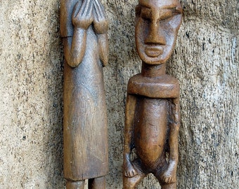 African wooden statues, the woman and the man. (May be sold separately).