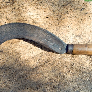 Antique sickle in superior cast steel &quot;noted Talabot&quot; 00, treated wooden handle.