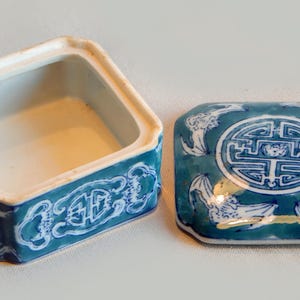 Blue ceramic candy box.