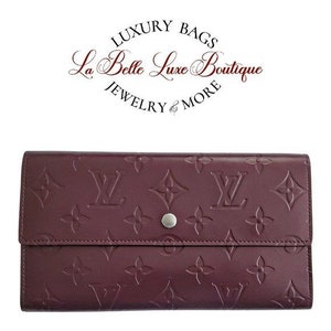 Louis Vuitton, large organiser/wallet, rubberised cotton…