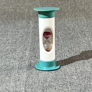Egg hourglass, plastic egg timer, GDR, Ostalgie, breakfast egg, boiled egg