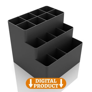 May include: A black plastic tiered organizer with multiple compartments. The organizer is designed to hold various items, such as pens, pencils, and other office supplies.
