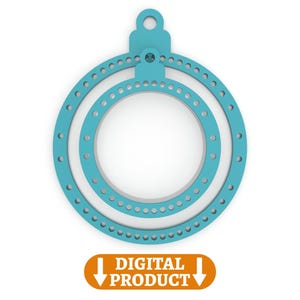 Puede incluir: Dos anillos de plástico azul turquesa con un agujero en el centro. Los anillos están anidados y tienen un pequeño bucle en la parte superior. PRODUCTO DIGITAL