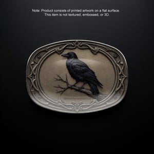 May include: Oval-shaped decorative plaque featuring a black crow perched on a branch, set against a tan background. The crow is detailed with textured feathers. The plaque has a silver-colored ornate border. The text "Optional Personalized Text" is at the bottom.