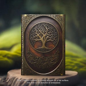 May include: A brown leather-bound journal with a gold embossed design featuring a tree of life motif. The journal has a decorative border and a vintage aesthetic.