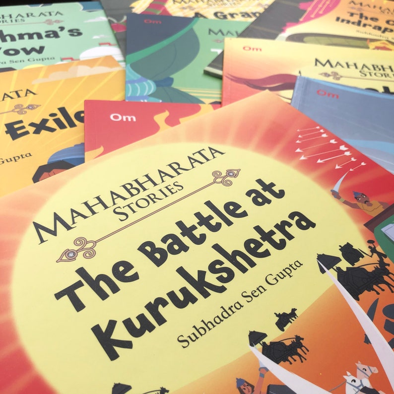 May include: A stack of colorful children's books about the Mahabharata, an epic Hindu poem. The top book is yellow with the title "The Battle at Kurukshetra" and the author's name "Subhadra Sen Gupta".