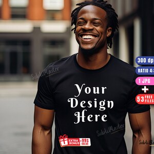 May include: A black t-shirt with the text "Your Design Here" in white. The shirt is being worn by a person with a smiling face. The image includes text about the product specifications, such as 300 dpi, ratio 4:3, 1 JPG, and 53 free files.