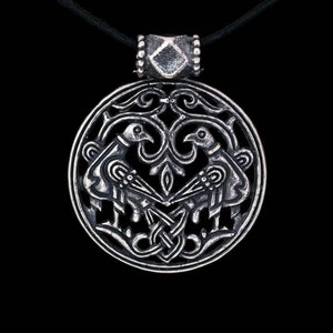 Two birds slavic style jewelry pendant. Traditional east europe Byzantium pattern slavic mythology north europe jewelry style. Medieval