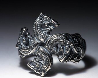 Wolf heads celtic european style jewelry ring. Solar pattern head of wolf. Figure of wolf north nordic jewelry viking style celtic ethnic