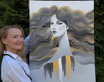 May include: A canvas painting depicting a woman with long, wavy hair in grey and gold tones. The artwork has a grey background with abstract gold and grey waves. The woman's neck and shoulders are visible, with a striped design in black, white, and gold.