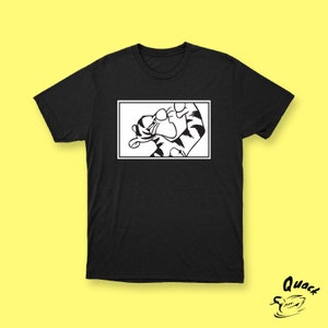 Könnte beinhalten: Schwarzes T-Shirt mit einer weißen Umrandung eines Cartoon-Tigers.