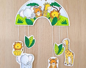 May include: A colorful mobile with a rainbow arch and hanging animal figures. The animals include a giraffe, a lion, a tiger, and an elephant. The mobile is made of paper and is perfect for a child's room.