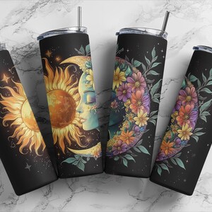 May include: Four stainless steel tumblers with different designs featuring a sun and moon with floral accents. The tumblers are black with a glossy finish.
