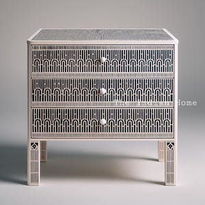 Op de afbeelding: Een witte dressoir met drie laden met zwarte geometrische inlegwerk. De dressoir heeft drie laden met witte knoppen en staat op vier poten.