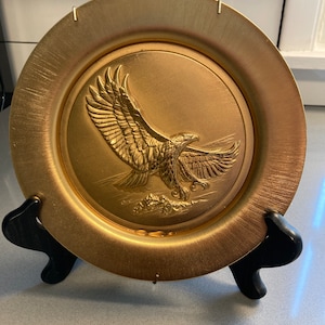 American Heritage First Edition gold plated soaring eagle designed and signed plate
