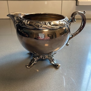 Silver multilayered plated Rogers and brothers “Exquisite-49X1-3” stamped creamer