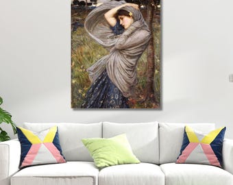 May include: A rectangular wall art print featuring a painting of a figure standing in a field, wearing a dark blue patterned skirt and a flowing grey shawl draped over their head and shoulders, with trees and a cloudy sky in the background.