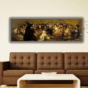 a large painting of a group of people on a wall above a brown couch in a living room setting.