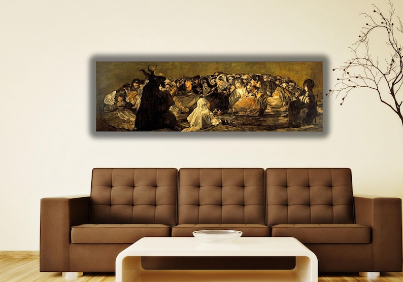a large painting of a group of people on a wall above a brown couch in a living room setting.