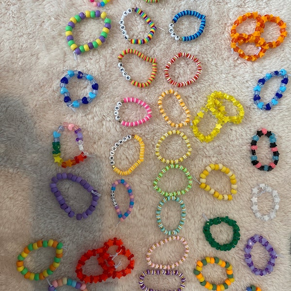 Bracelets for charity - handmade by 10 year old. Friendship, gift, party bags and more.