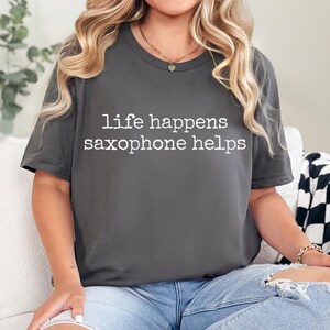 Life Happens Saxophone Helps Shirt, Funny Saxophonist TShirt, Musican Shirt, Jazz Lover Tee, Music Saxophone Teacher Gift, Sax Lover Gift