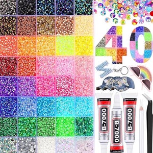May include: A selection of craft supplies including a container of colourful rhinestones, tubes of B-7000 glue, tweezers, a pencil, and denim baseball caps decorated with rhinestones and butterfly designs.