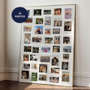 May include: A large framed collage featuring 39 photos, arranged in a grid pattern. The photos are of various sizes and depict people and landscapes. A navy blue circular sticker with the text "39 PHOTOS" is in the upper left corner.