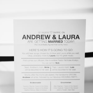 May include: A black and white wedding announcement card with the text "Andrew & Laura are getting married today!" and a list of the wedding order of events. The card also includes the date "07.18.2015" and the location "Barrie, ON".