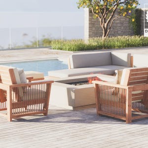 May include: Two wooden chairs with white cushions sit on a wooden deck next to a fire pit and a white sectional sofa. The chairs have a slatted design and are made of natural wood. The fire pit is made of stone and has a fire burning inside. The sofa is made of white fabric and has a modern design.