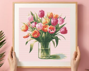 May include: A framed painting of a bouquet of pink, orange, and yellow tulips in a clear glass vase. The tulips are arranged in a vase on a white and pink striped background.
