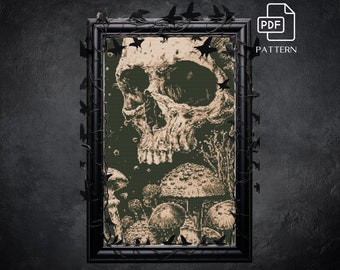 May include: A black and white cross-stitch pattern featuring a skull surrounded by mushrooms. The pattern is framed in a black frame with a vine design.