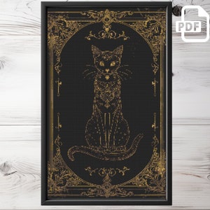 May include: A black cat with gold details sits inside a gold ornate frame on a black background. The frame has a decorative design with floral motifs and keyhole shapes.